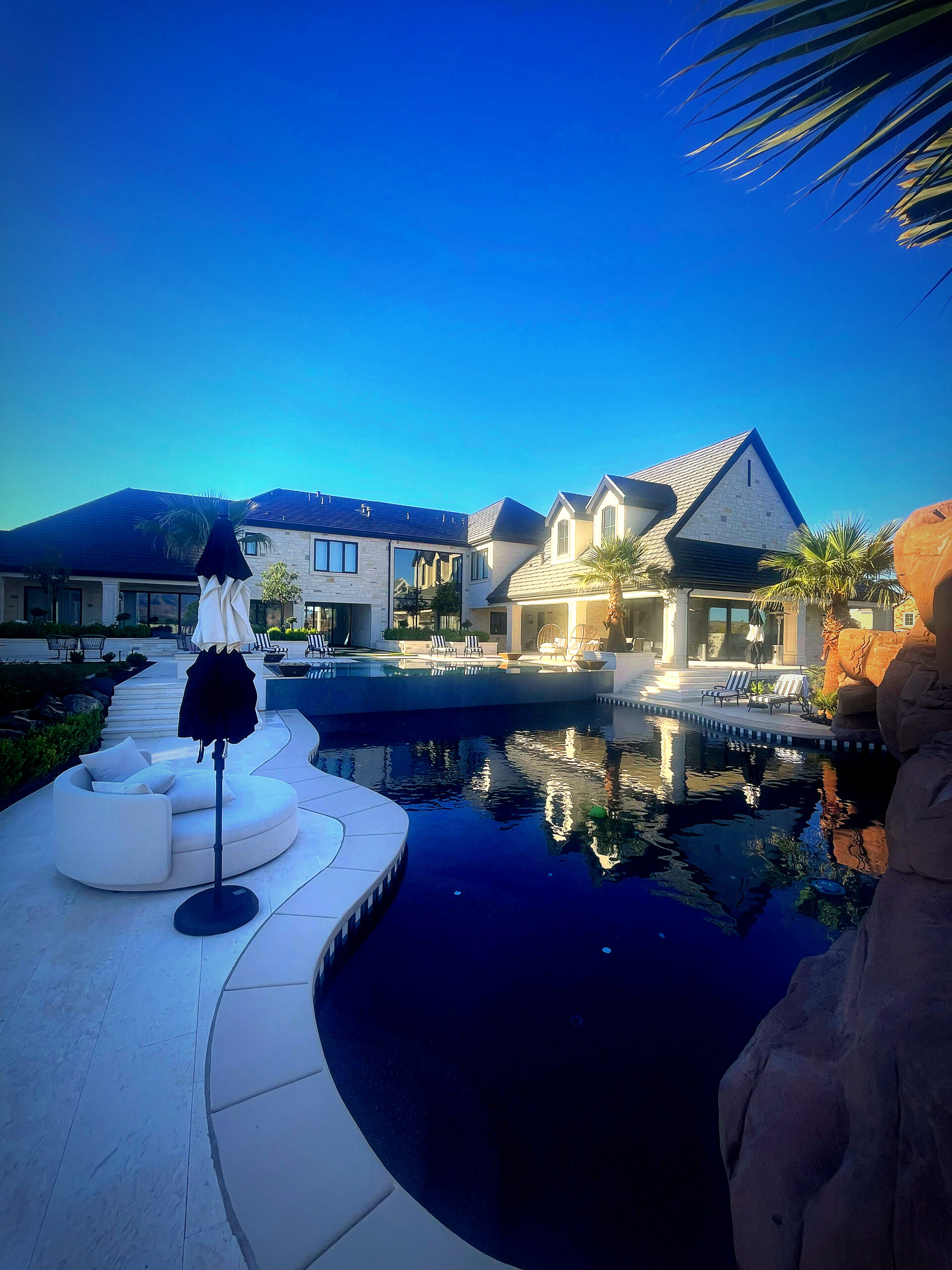 Del Tanner reviewing pool design plans with Southern Utah homeowner